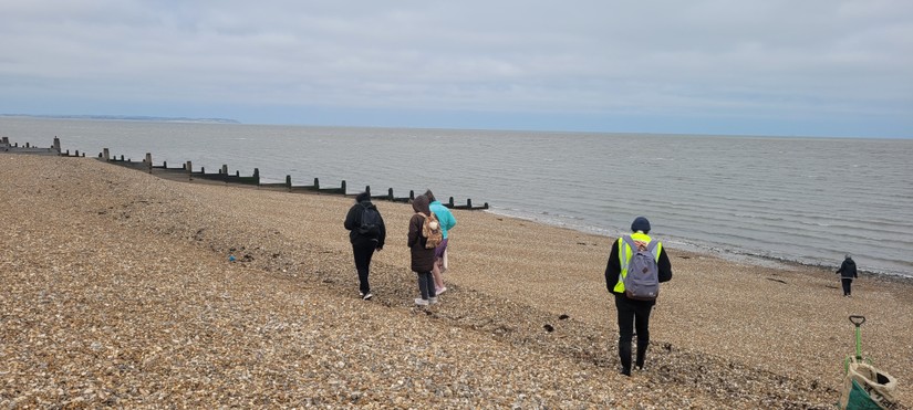 Lawrence from the Coasts in Mind team recording sounds from the foreshore along with members of East Kent Mencap collecting items for the sensory box.