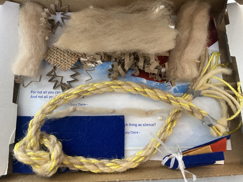 Items from a Creative Session including a piece of knotted hand-made rope.