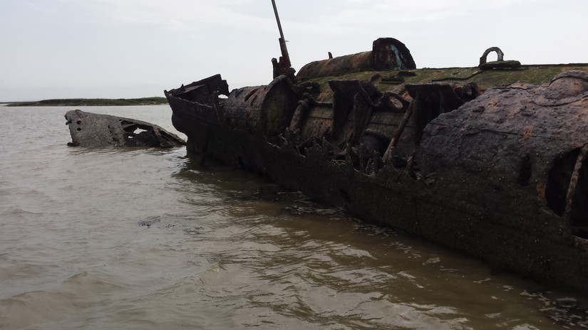 The remains of a hulked U-boat of the English coast,