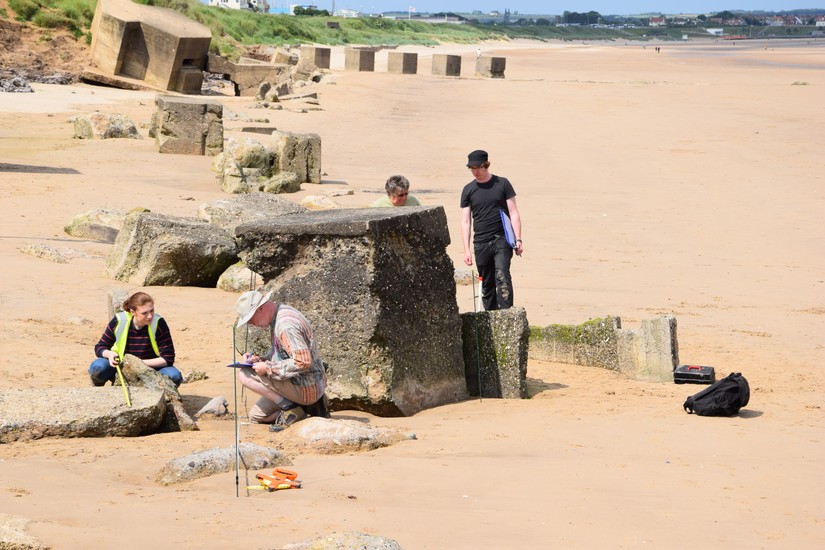 John, Chris and the CITiZAN team record destroyed coastal defences on the shore of Bridlington Bay