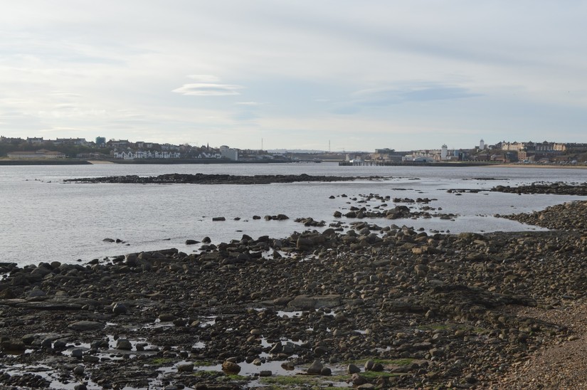 5.	The Black Middens in the middle distance, with the foundations of Tynemouth Lifeboat House Number 2 at the bottom right, and the High and Low Lights centre right.