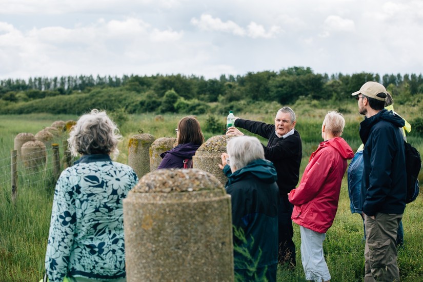 Military historian Ron Stilwell shows CITiZAN volunteers round Pegwell Bay during the training weekend, June 2016