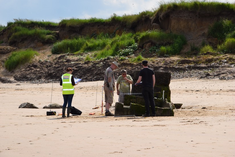 Volunteers record a WW1 pillbox on Bridlington Beach