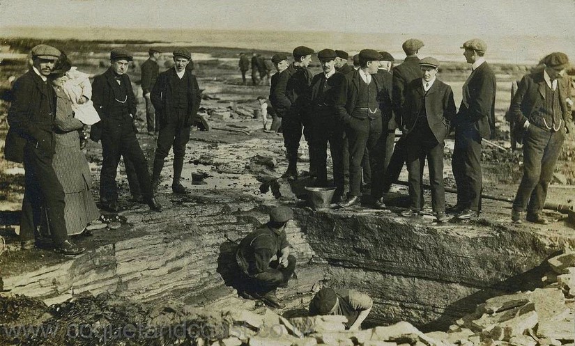 Striking miners on Amble foreshore, postcard c1910