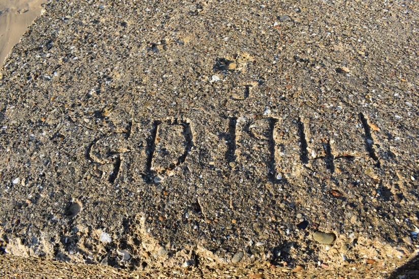 Wartime graffiti found in the surface of an anti-tank block