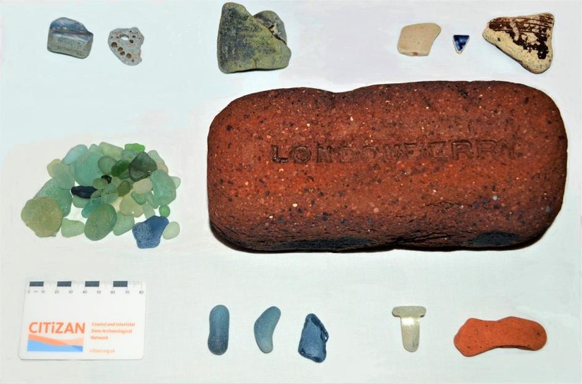 Finds from Blast Beach, Seaham: pot, stone, glass, brick