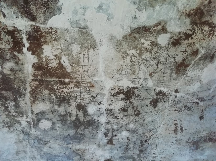 Graffiti, showing a sailing ship etched on to the walls of 'The Black Hole'. The location for Sam and Chris's video. 