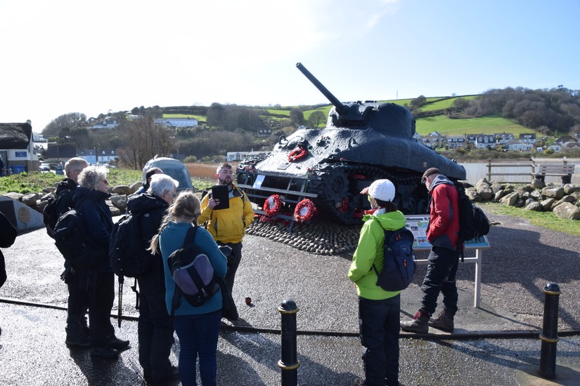 describing the events of Operation Tiger at the close of the walk, next to the local war memorial dedicated to the lives lost there