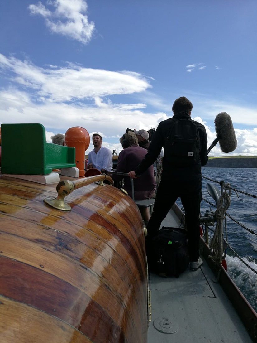 All aboard! The crew squeeze in for an interview